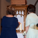 Mother's Lighting Candles